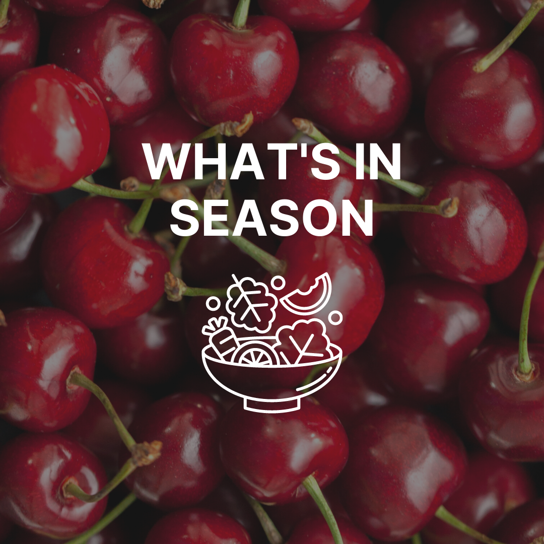"What's in Season" written over the image of a bowl of cherries.