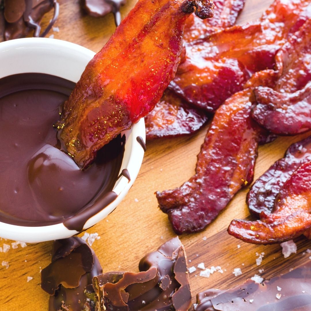 Sweet and salty candied bacon dipped in chocolate.